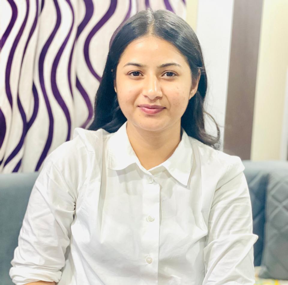 Dr Komal